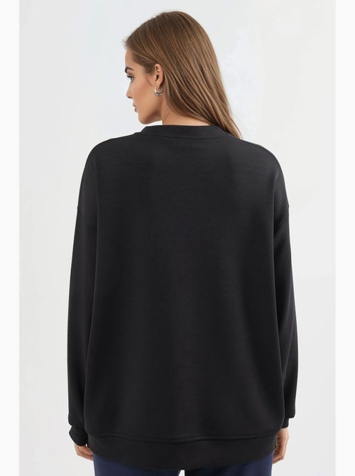 Sweatshirt de malha relaxed fit com decote redondo busem - Kiabi Sweatshirt de malha relaxed fit com decote redondo busem - Kiabi