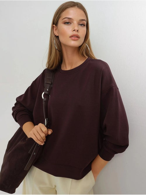 Sweatshirt de modal relaxed fit com gola redonda busem - Kiabi Sweatshirt de modal relaxed fit com gola redonda busem - Kiabi