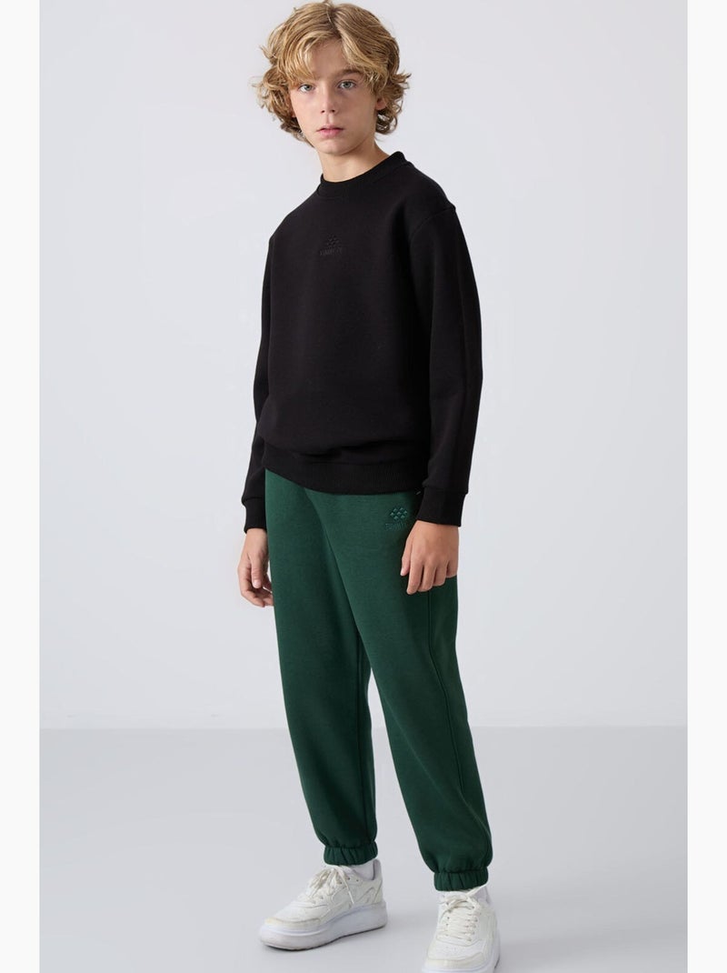 Sweatshirt infantil gola redonda bordada tommy Preto - Kiabi