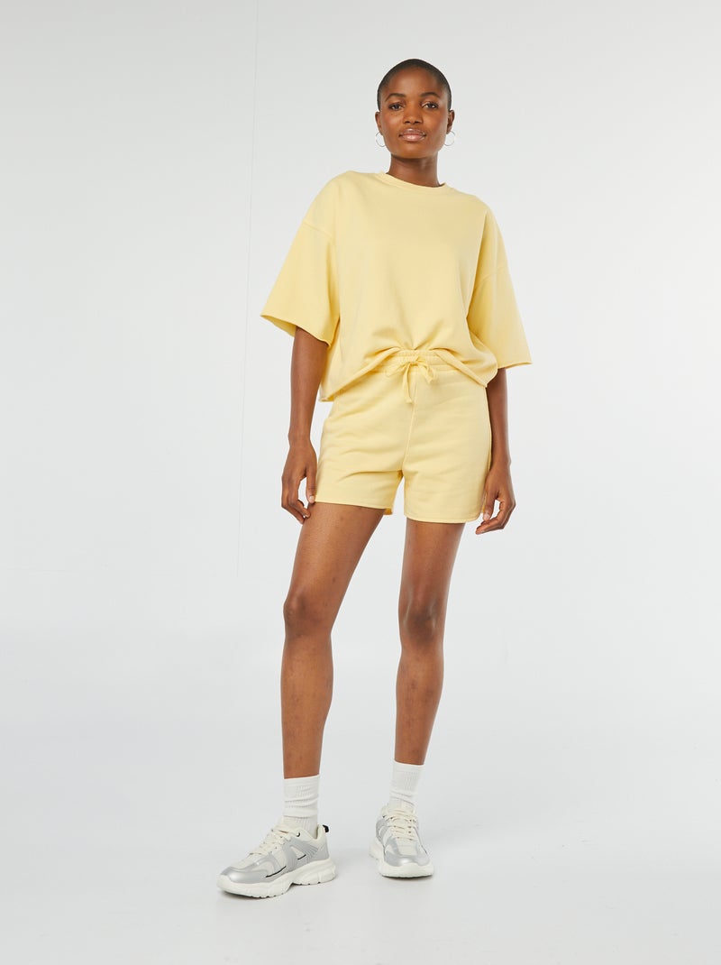 Sweatshirt larga de manga curta AMARELO - Kiabi