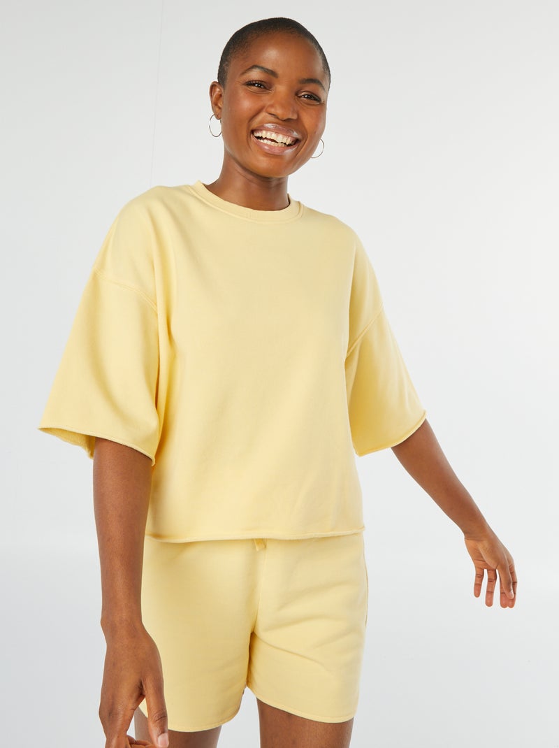 Sweatshirt larga de manga curta AMARELO - Kiabi