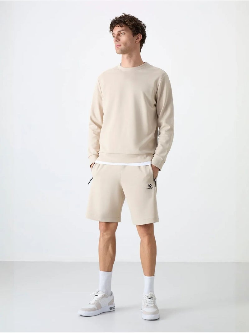 Sweatshirt lisa de homem com gola redonda tommy Bege-argila - Kiabi