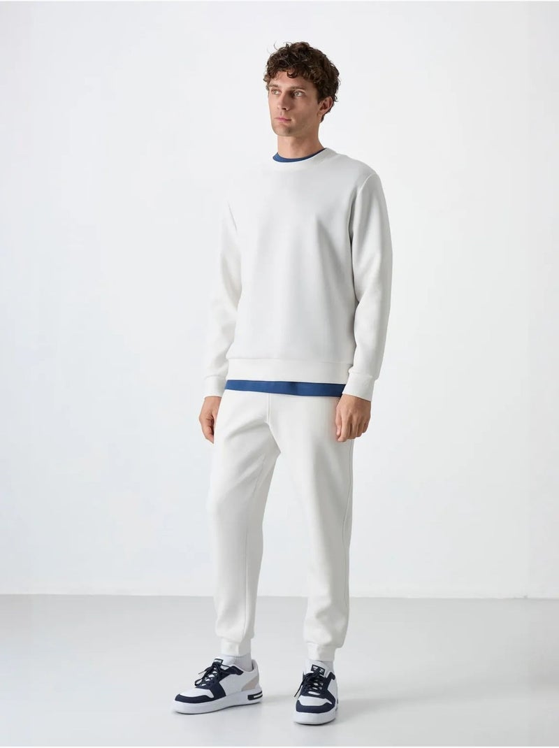 Sweatshirt lisa de homem com gola redonda tommy Branco sujo - Kiabi