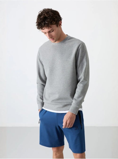 Sweatshirt lisa de homem com gola redonda tommy - Kiabi
