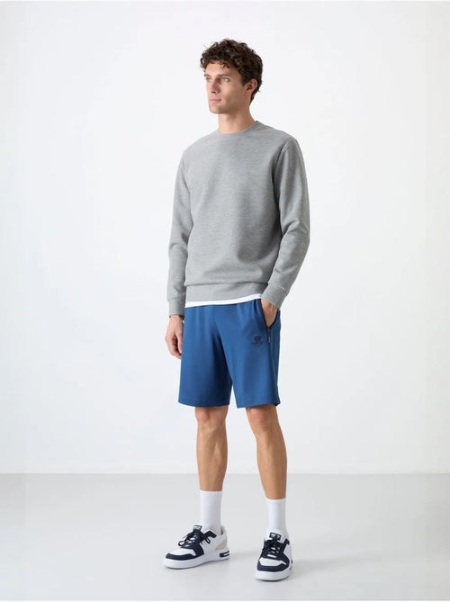 Sweatshirt lisa de homem com gola redonda tommy - Kiabi