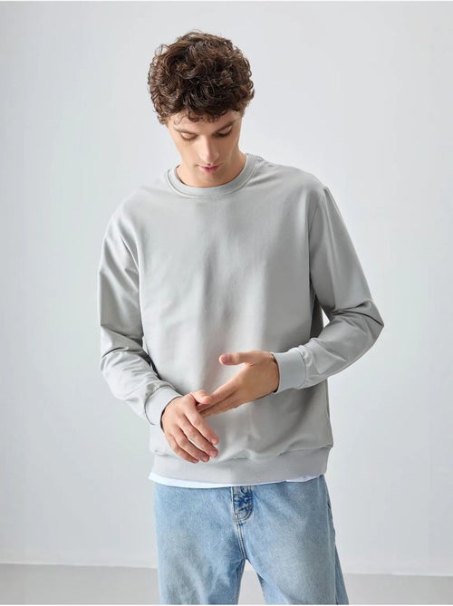 Sweatshirt lisa de homem com gola redonda tommy - Kiabi