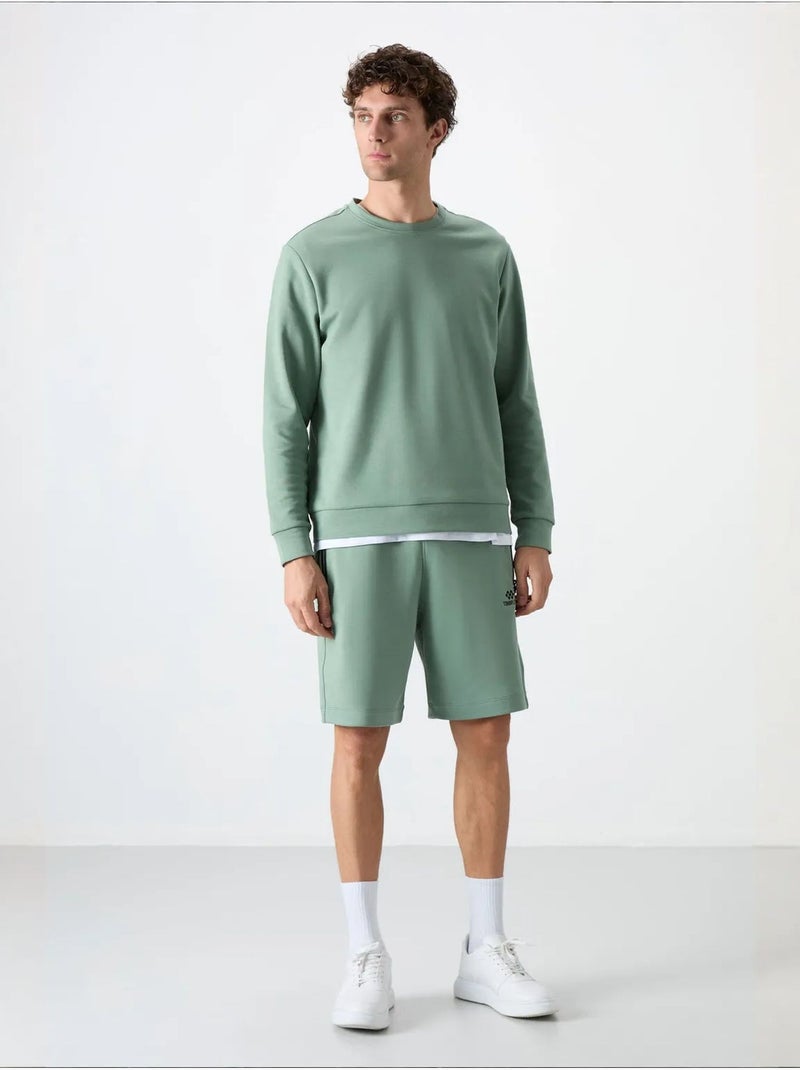 Sweatshirt lisa de homem com gola redonda tommy Verde - Kiabi