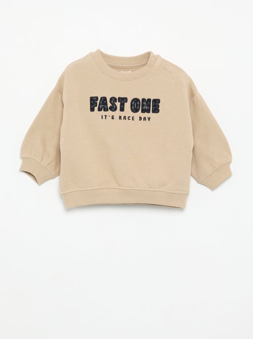 Sweatshirt liso com estampado no peito - Kiabi Sweatshirt liso com estampado no peito - Kiabi