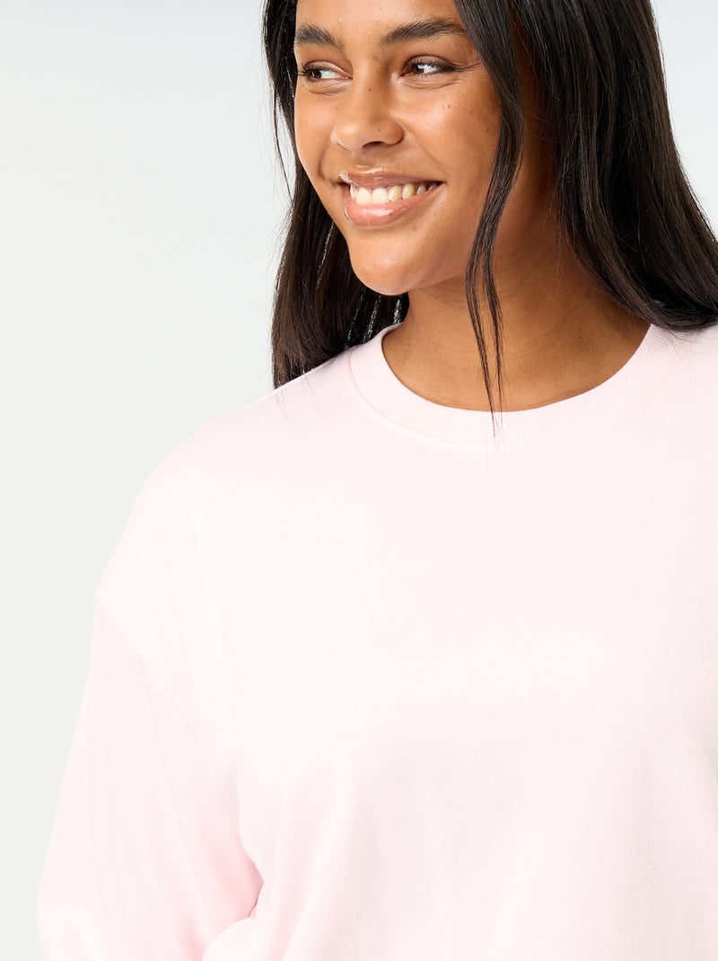 Sweatshirt liso de gola redonda em French Terry Rosa - Kiabi