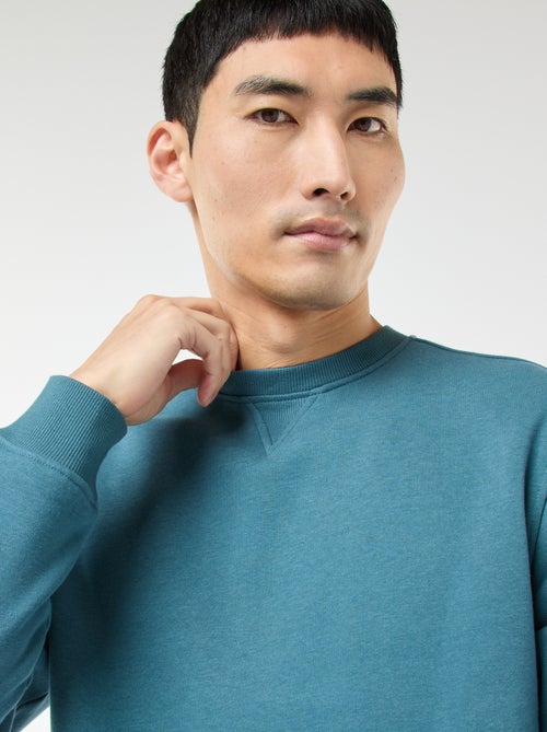 Sweatshirt liso de gola redonda em moletom cardado - Kiabi