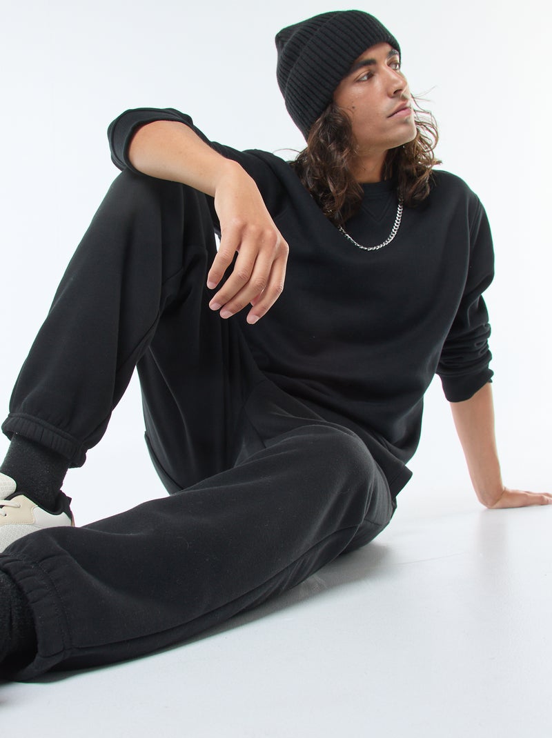 Sweatshirt liso de gola redonda em moletom felpudo Preto - Kiabi
