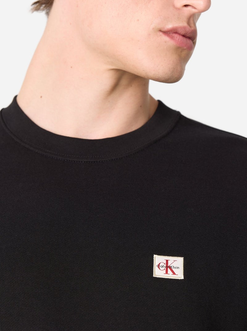Sweatshirt masculina calvin klein jeans badge terry preta Preto - Kiabi