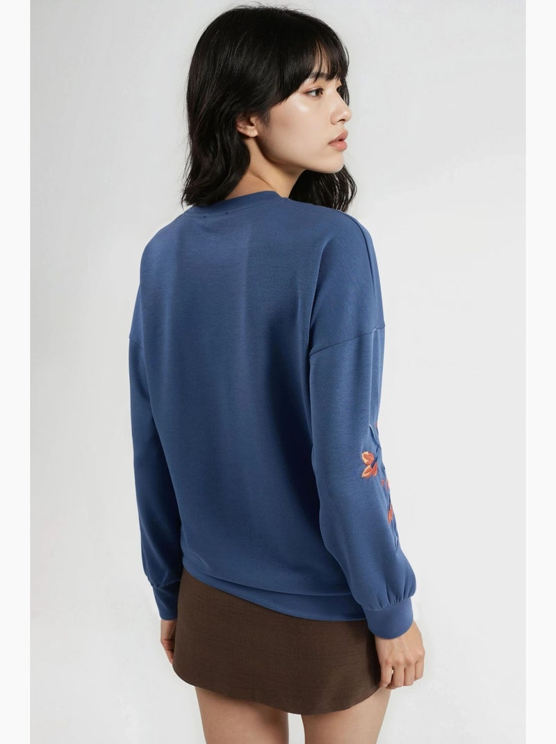 Sweatshirt modal touch com gola redonda e bordado, coleção bersan hiccup Azul claro - Kiabi