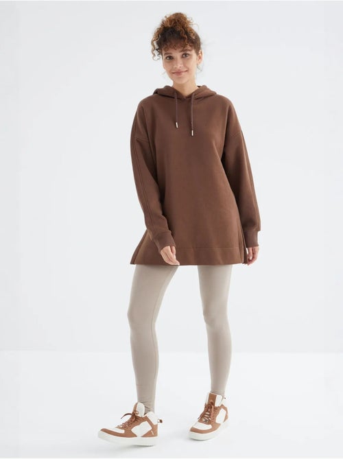 Sweatshirt oversized com capuz e bolso tommy - Kiabi Sweatshirt oversized com capuz e bolso tommy - Kiabi