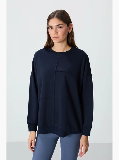 Sweatshirt oversized com gola redonda tommy - Kiabi Sweatshirt oversized com gola redonda tommy - Kiabi