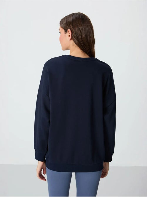 Sweatshirt oversized com gola redonda tommy - Kiabi Sweatshirt oversized com gola redonda tommy - Kiabi