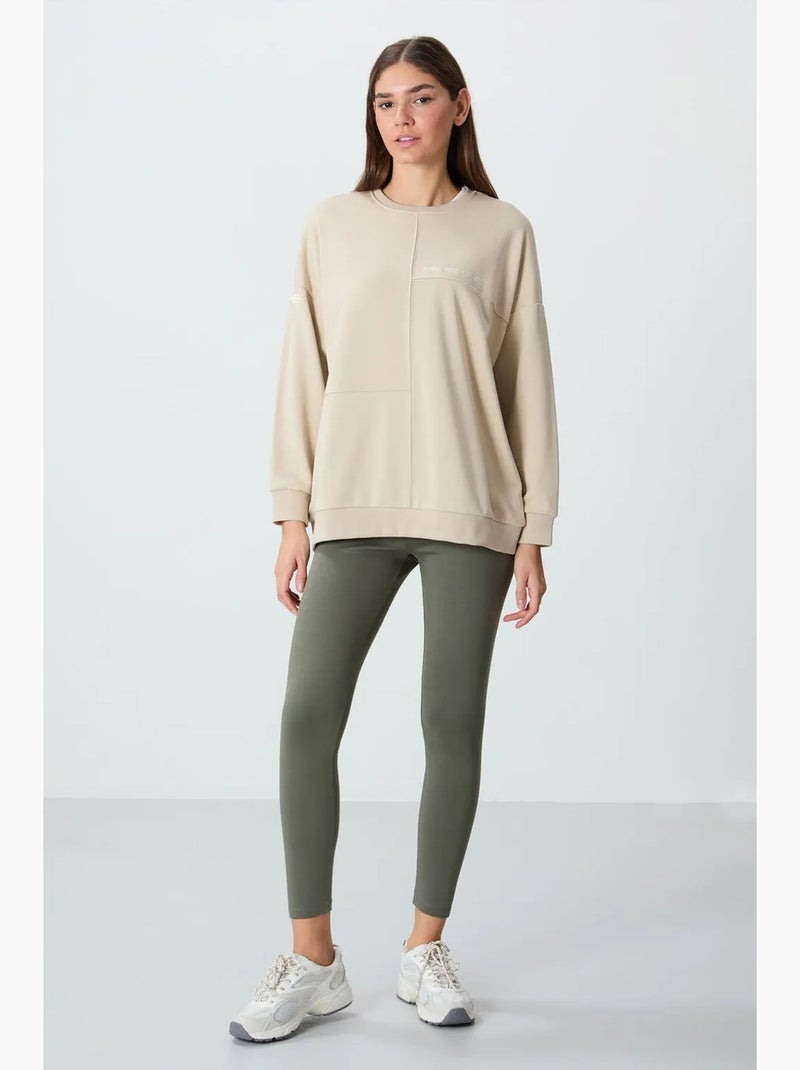 Sweatshirt oversized com gola redonda tommy Bege-argila - Kiabi