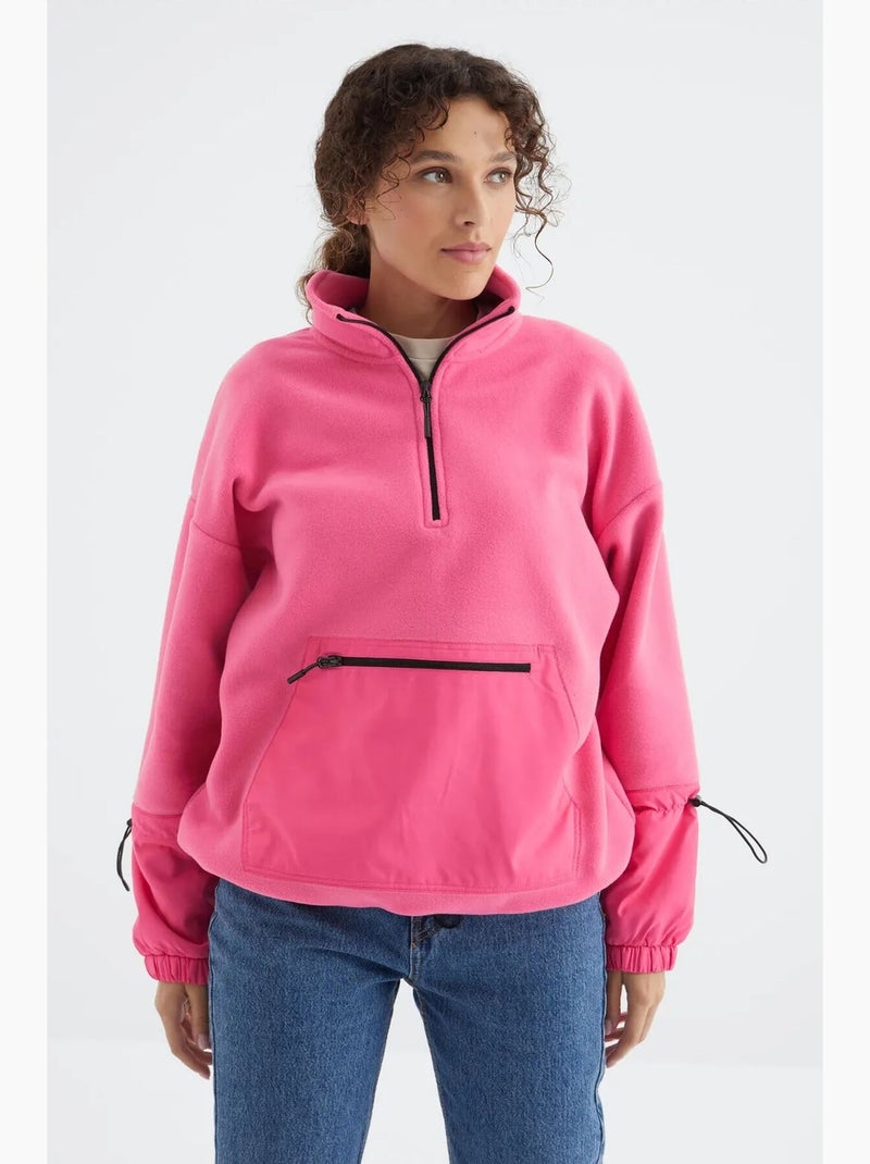 Sweatshirt oversized em pelúcia com meio zíper tommy Rosa-fluo/Solinotes - Kiabi