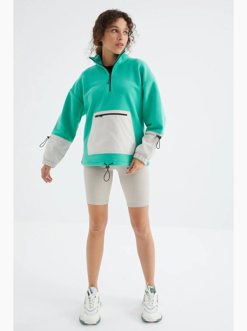 Sweatshirt oversized em pelúcia com meio zíper tommy Verde menta - Kiabi
