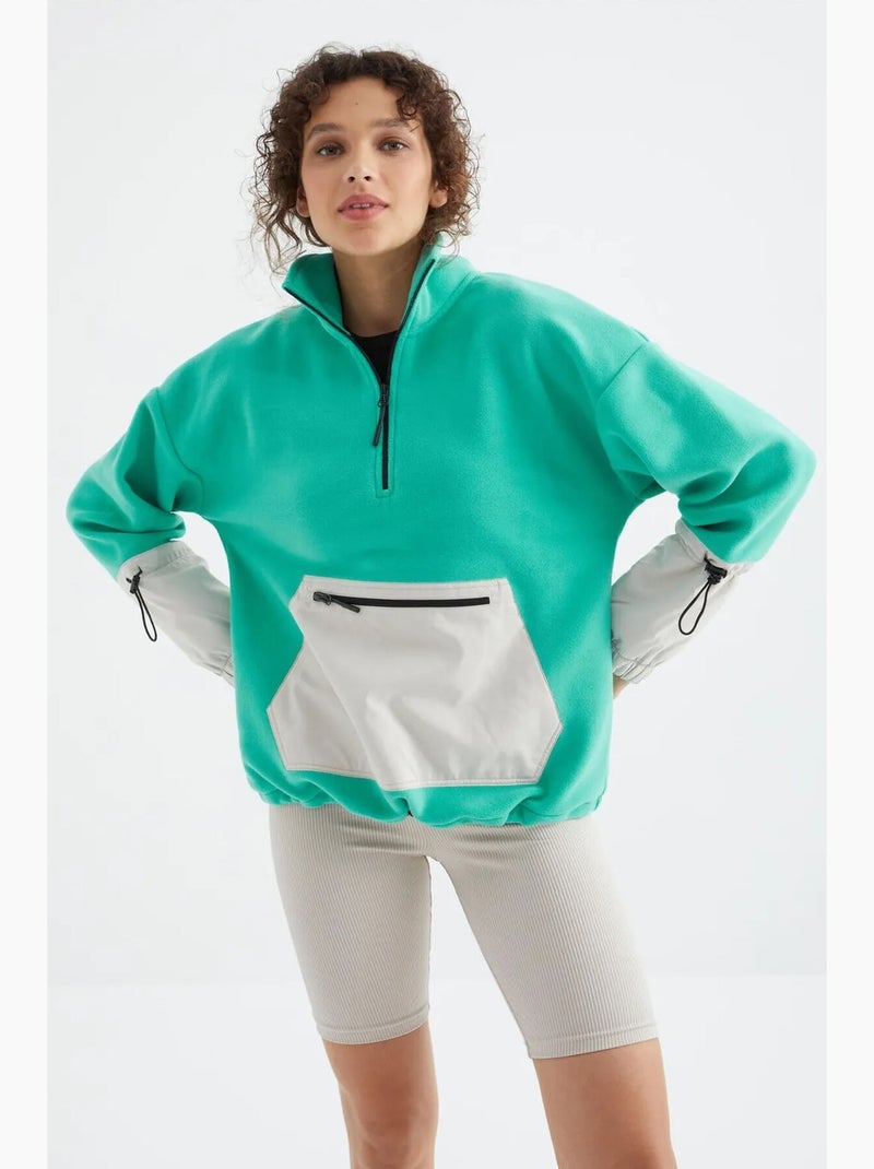 Sweatshirt oversized em pelúcia com meio zíper tommy Verde menta - Kiabi