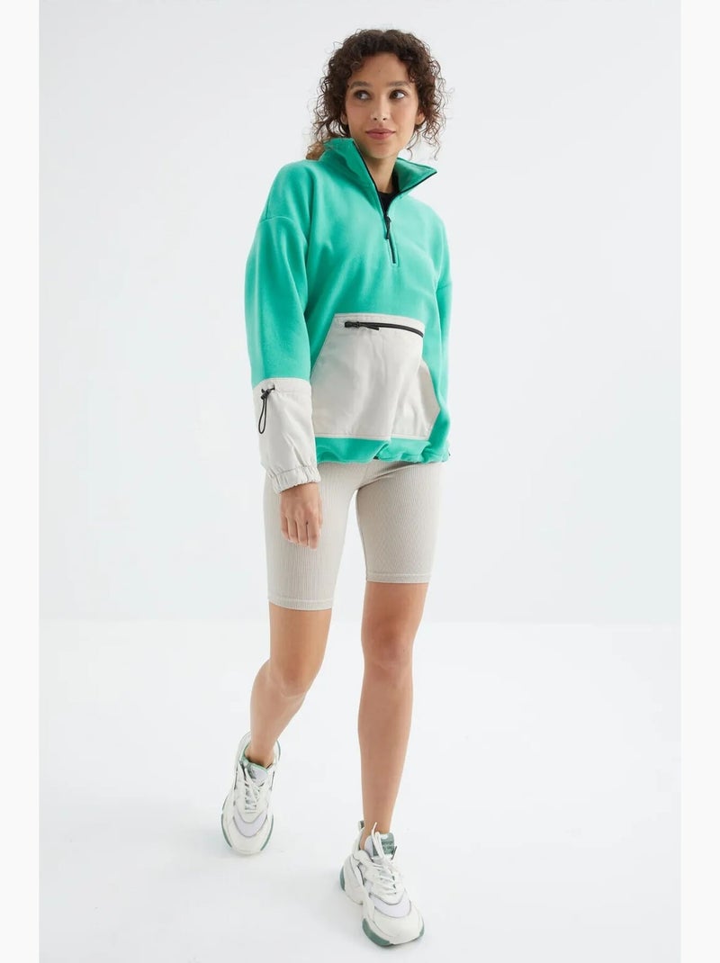 Sweatshirt oversized em pelúcia com meio zíper tommy Verde menta - Kiabi