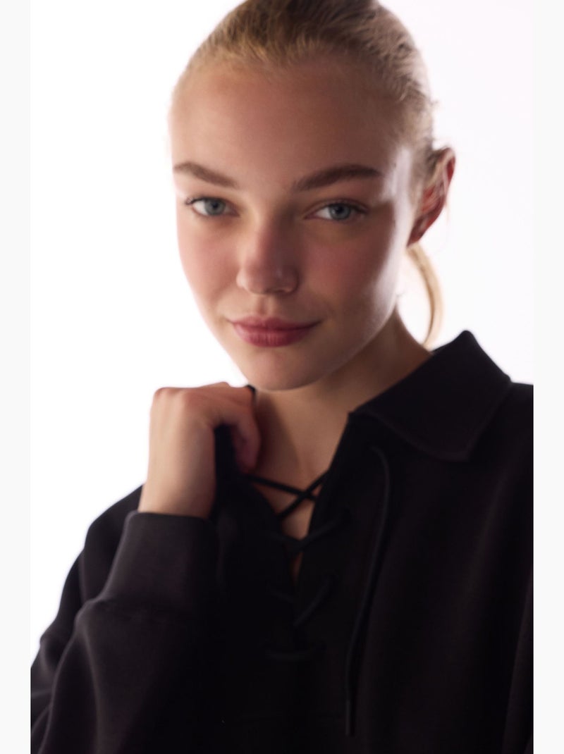 Sweatshirt silky touch com cordões e manga comprida penti Preto - Kiabi