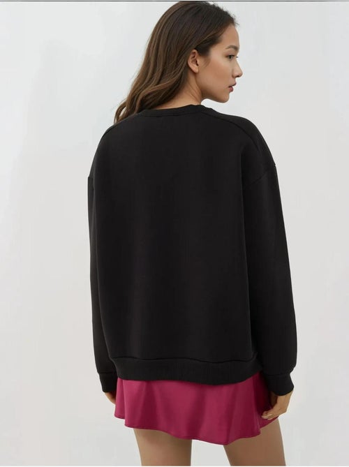 Sweatshirt texturizada de gola redonda com detalhe de fecho hiccup - Kiabi Sweatshirt texturizada de gola redonda com detalhe de fecho hiccup - Kiabi