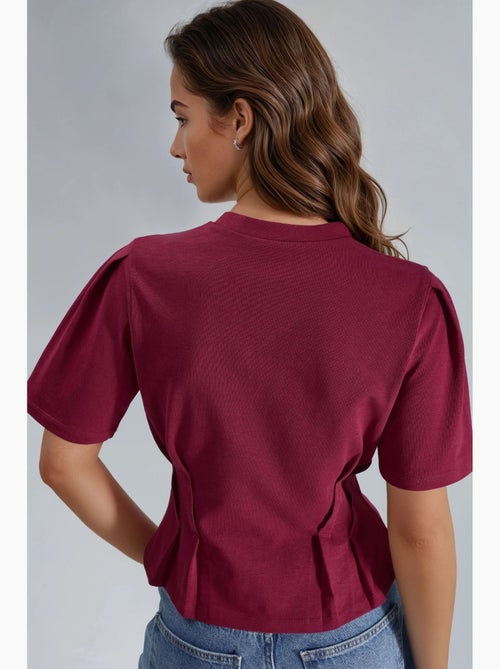 T-shirt ajustada com gola redonda hiccup - Kiabi T-shirt ajustada com gola redonda hiccup - Kiabi