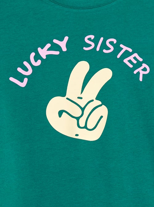 T-shirt às riscas em algodão - Kiabi