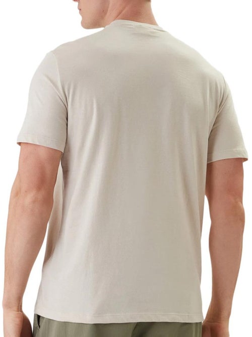 T-shirt bege calvin klein jeans com crachá para homem - Kiabi T-shirt bege calvin klein jeans com crachá para homem - Kiabi