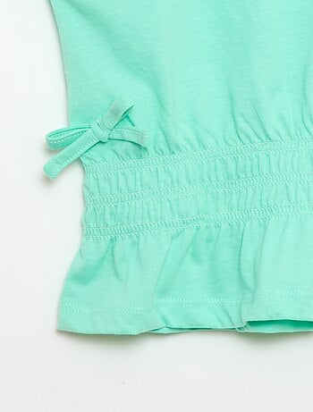 T-shirt com aplicação smock e laços na cintura