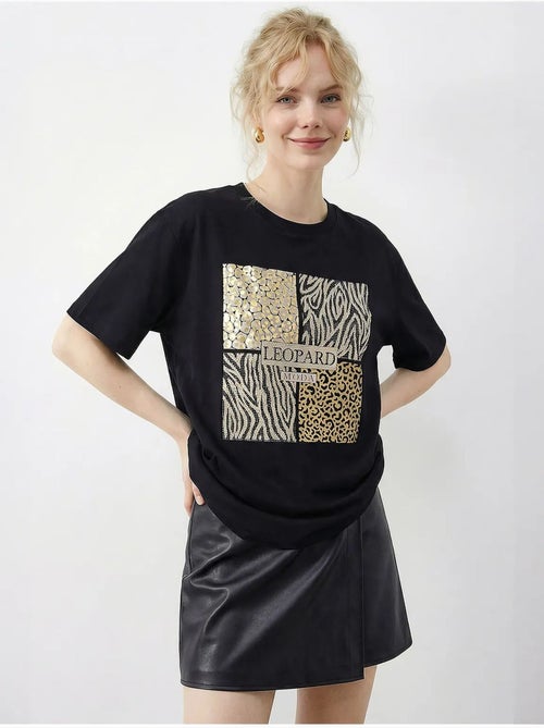T-shirt com estampado de leopardo e lantejoulas, gola redonda. Lucci - Kiabi T-shirt com estampado de leopardo e lantejoulas, gola redonda. Lucci - Kiabi