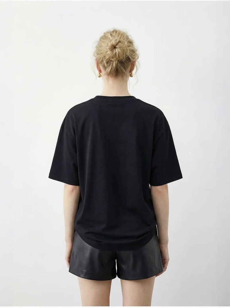 T-shirt com estampado de leopardo e lantejoulas, gola redonda. Lucci Preto - Kiabi