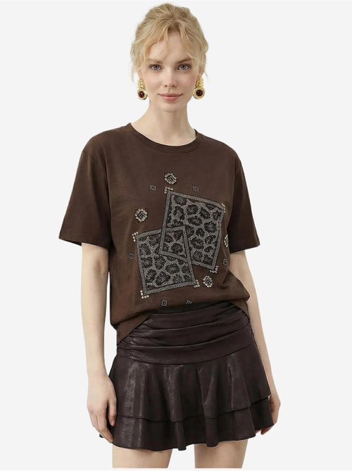 T-shirt com gola redonda e estampado geométrico de lantejoulas lucci - Kiabi T-shirt com gola redonda e estampado geométrico de lantejoulas lucci - Kiabi