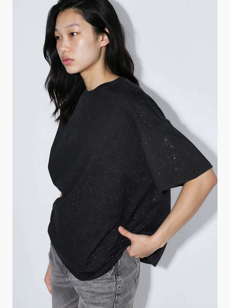 T-shirt com lantejoulas, gola redonda e manga curta busem Preto - Kiabi