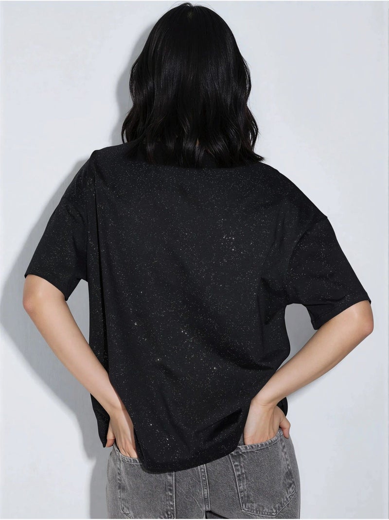 T-shirt com lantejoulas, gola redonda e manga curta busem Preto - Kiabi