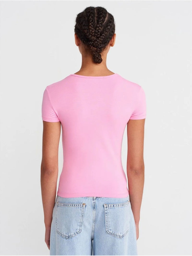 T-shirt crop de mulher slim fit com decote redondo dilvin Rosa-fluo/Solinotes - Kiabi