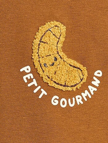 T-shirt de malha de manga curta com bolso no peito estampado