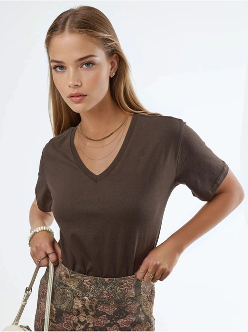 T-shirt de malha lisa com decote em v busem - Kiabi T-shirt de malha lisa com decote em v busem - Kiabi