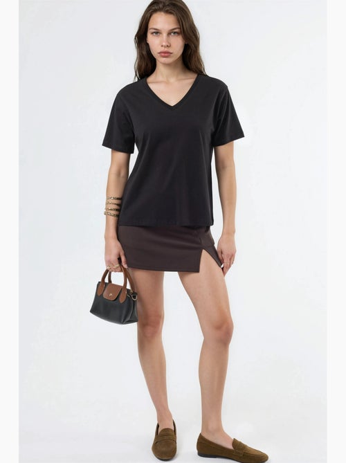 T-shirt de malha lisa com decote em v busem - Kiabi T-shirt de malha lisa com decote em v busem - Kiabi