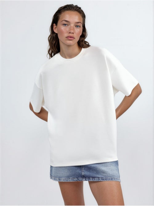 T-shirt de malha oversized com gola redonda e toque de modal hiccup - Kiabi T-shirt de malha oversized com gola redonda e toque de modal hiccup - Kiabi
