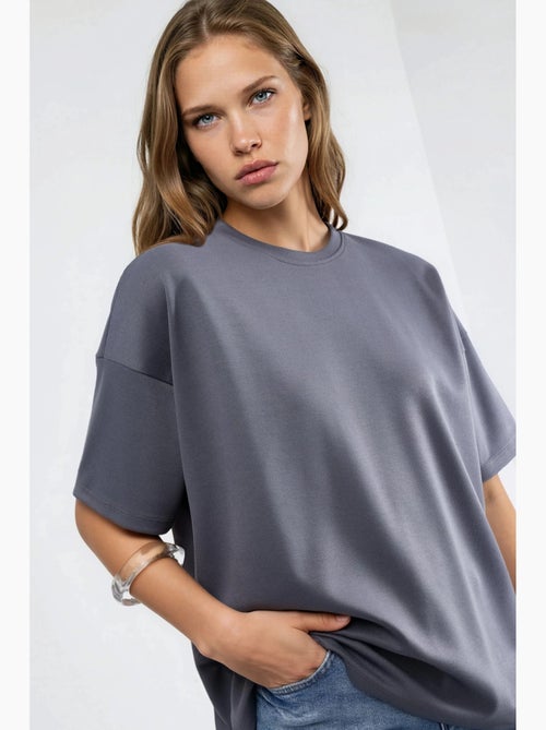T-shirt de malha oversized com gola redonda e toque de modal hiccup - Kiabi T-shirt de malha oversized com gola redonda e toque de modal hiccup - Kiabi