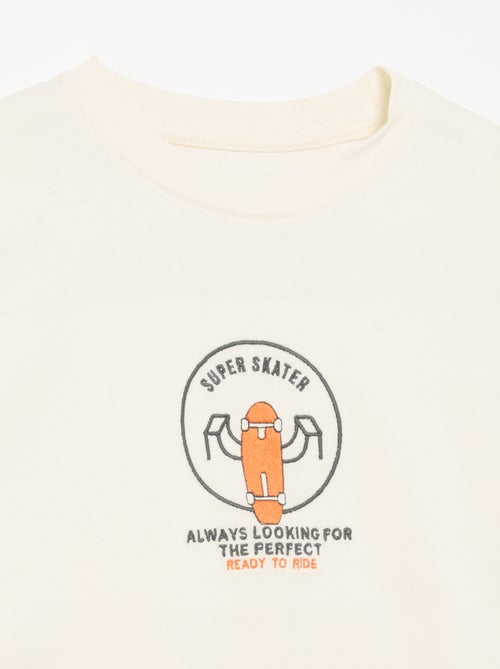 T-shirt de manga comprida com patches à frente e nas costas - Kiabi T-shirt de manga comprida com patches à frente e nas costas - Kiabi