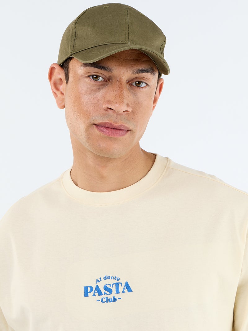 T-shirt de manga curta com estampados e bordados à frente e atrás Amarelo - Kiabi