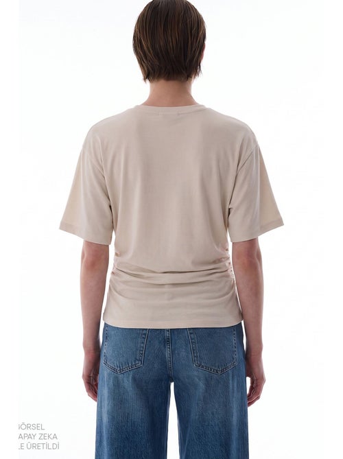 T-shirt de mulher em modal com detalhe na cintura e franzido penti - Kiabi T-shirt de mulher em modal com detalhe na cintura e franzido penti - Kiabi