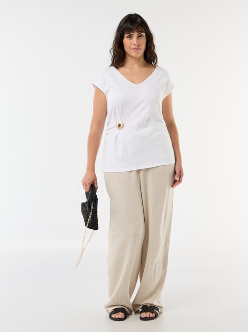 T-shirt drapeada com joia dourada - Kiabi T-shirt drapeada com joia dourada - Kiabi