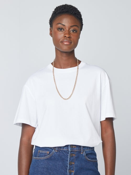 T-shirt em algodão para mulher com gola redonda e mangas curtas - Kiabi T-shirt em algodão para mulher com gola redonda e mangas curtas - Kiabi