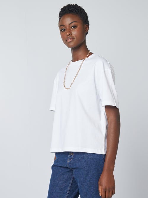 T-shirt em algodão para mulher com gola redonda e mangas curtas - Kiabi T-shirt em algodão para mulher com gola redonda e mangas curtas - Kiabi