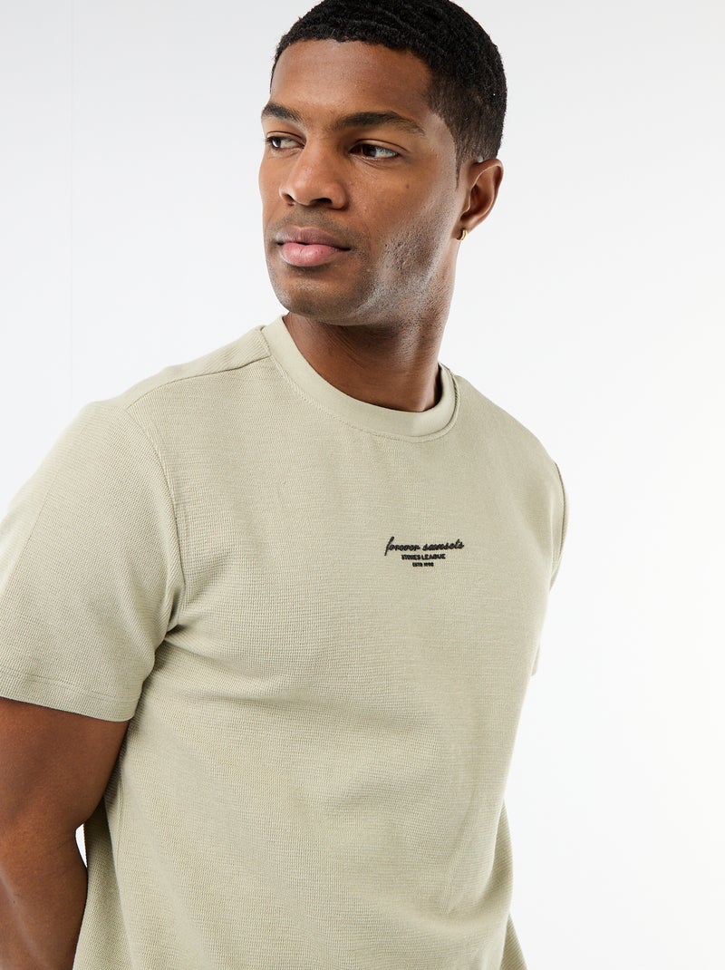 T-shirt em piqué de algodão com mangas curtas Bege - Kiabi