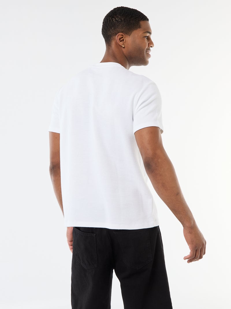 T-shirt em piqué de algodão com mangas curtas Branco - Kiabi